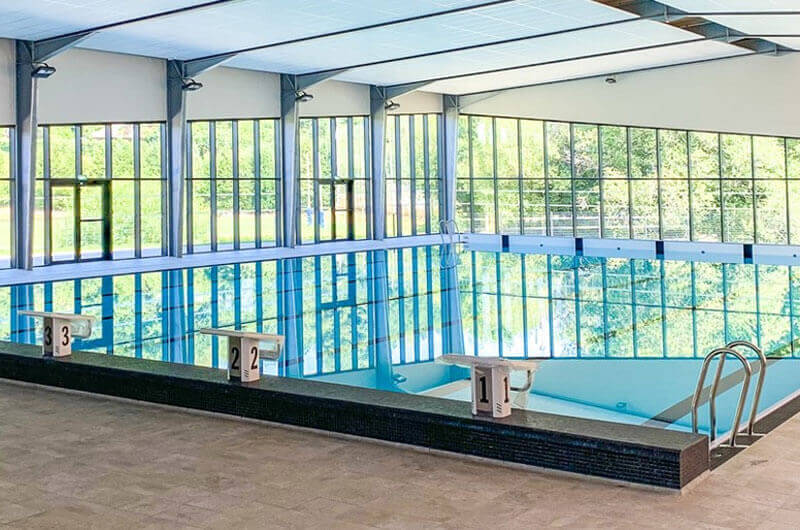 Réhabilitation, extension et transformation en espace aquarécréatif de la piscine